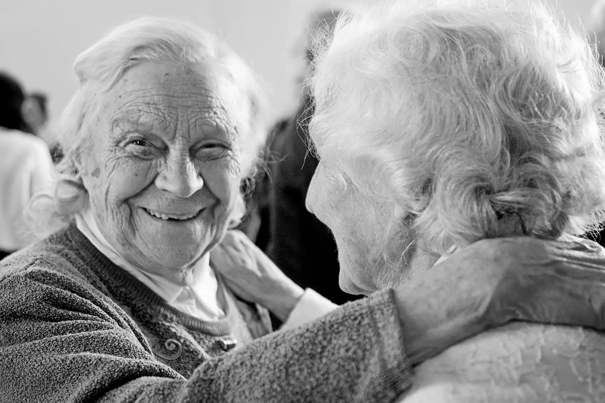 Two friends laughing together